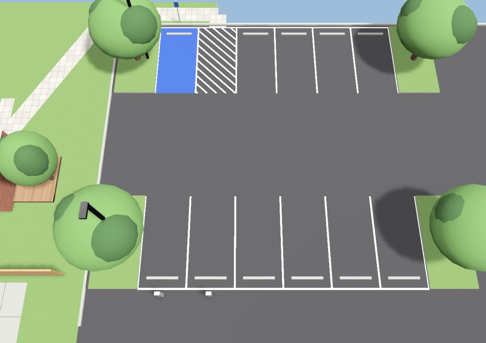 A parking lot as built: striping, accessible spaces, islands and lights.